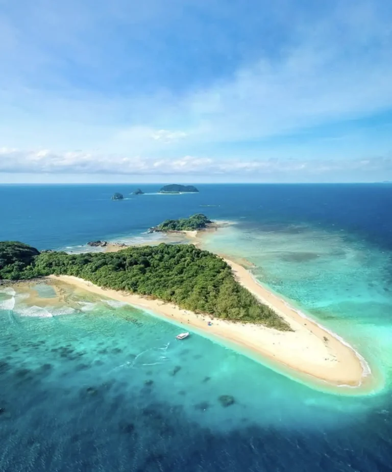 Aerial view of Frankland Islands surrounded by coral reefs