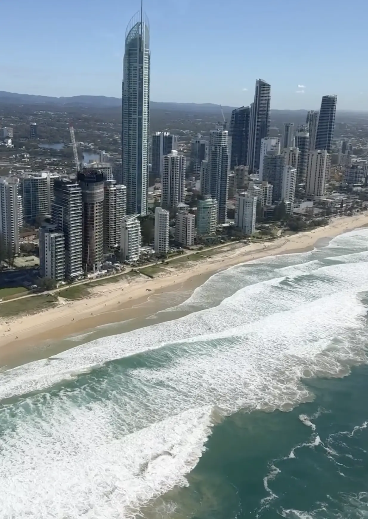 Surfer riding waves at Burleigh Heads on the Gold Coast
