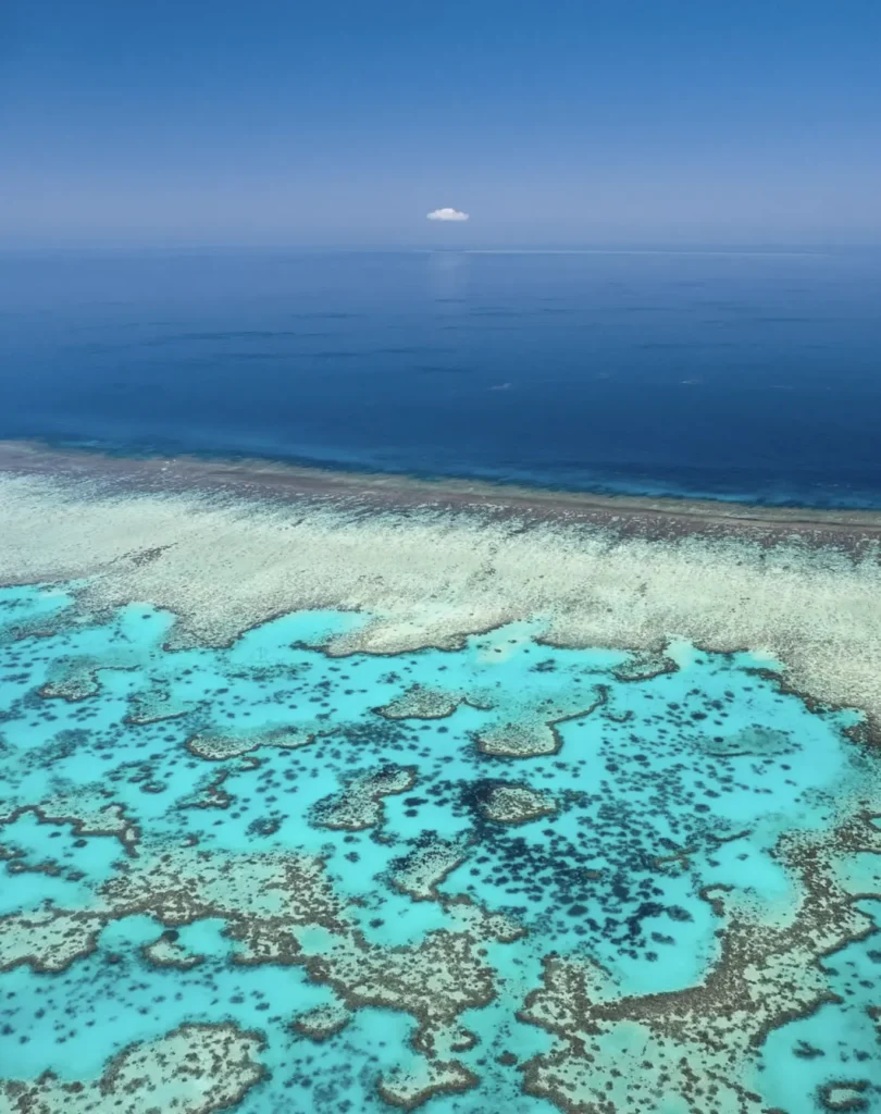 breaking waves over shallow reef near Fitzroy Island