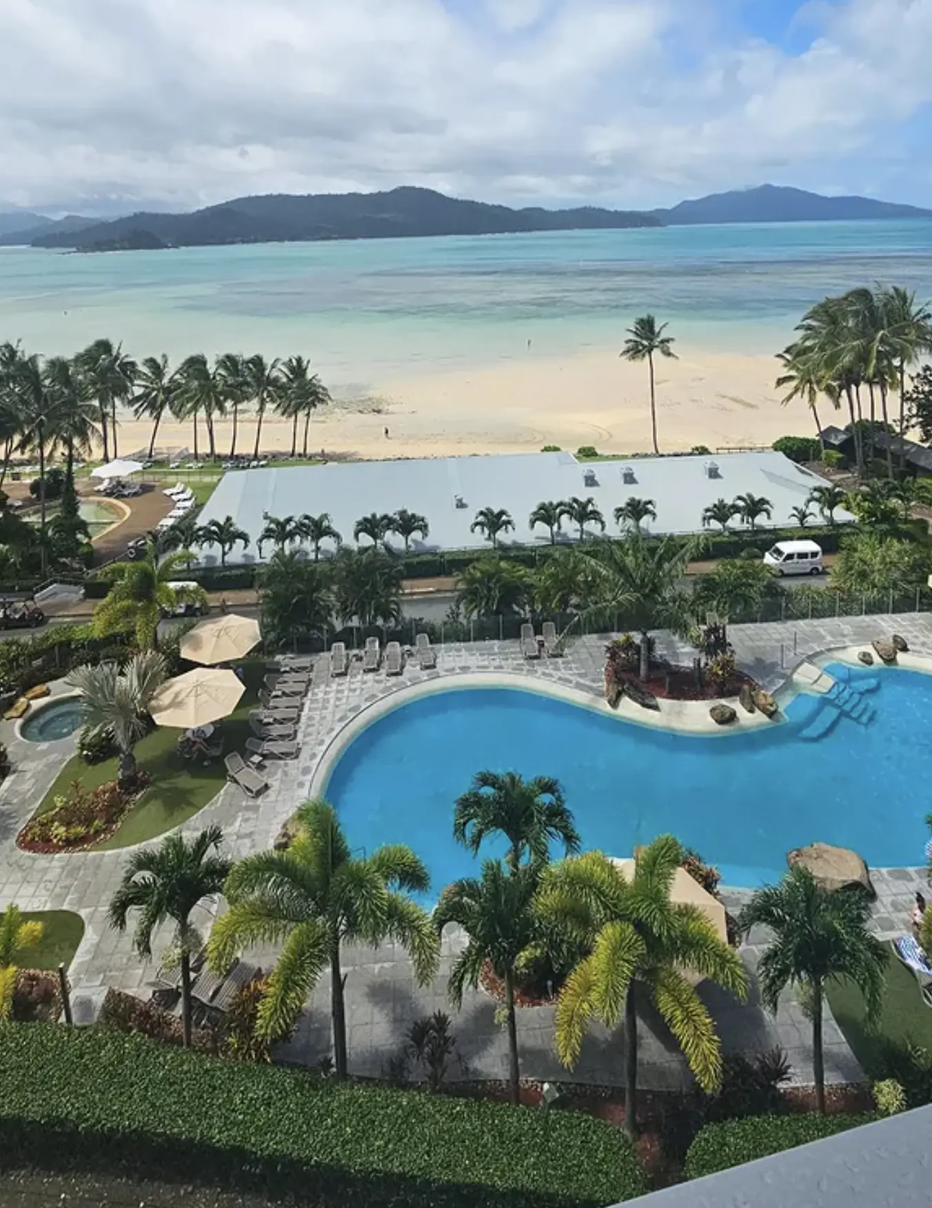 relaxing at Hamilton Island resort pool